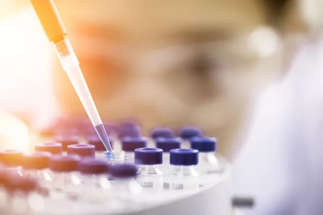 researcher with a pipette. photo.