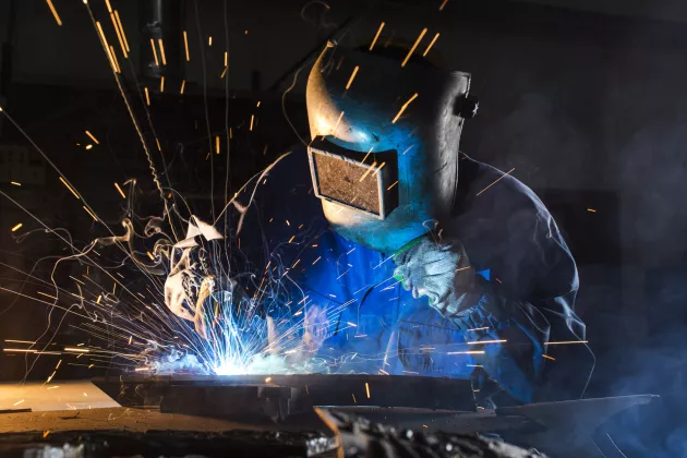 Photography of a welder in action. Photo: iStock