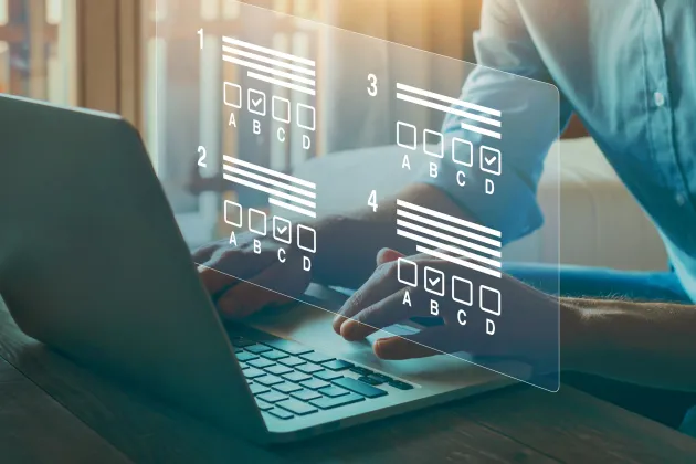 A person taking a digital test, illustration/photography. Photo: iStock